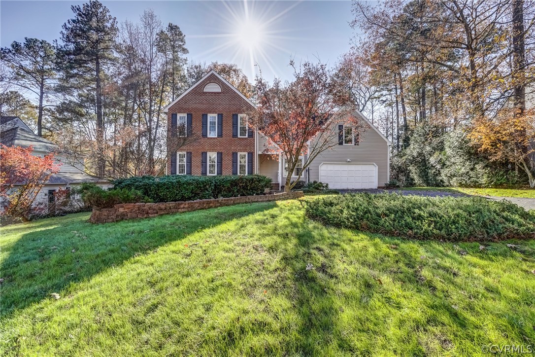 6205 Lansgate Road Midlothian, VA 23112 - Photo 2 of 50 a front view of a house with garden