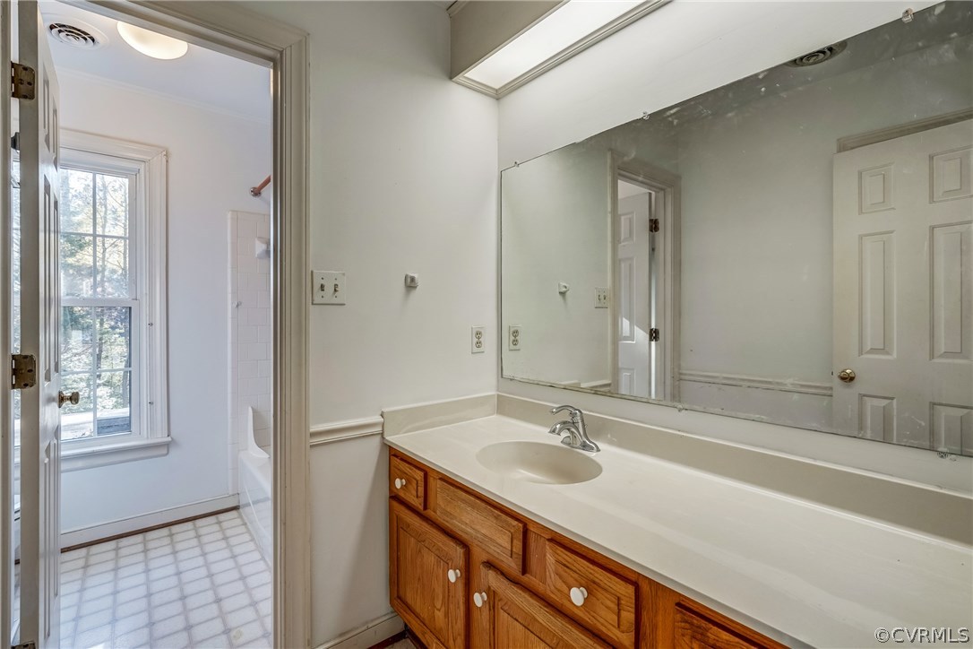 6205 Lansgate Road Midlothian, VA 23112 - Photo 38 of 50 a bathroom with a sink double vanity and a mirror