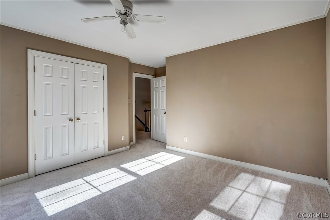 6205 Lansgate Road Midlothian, VA 23112 - Photo 40 of 50 an empty room with windows and closet
