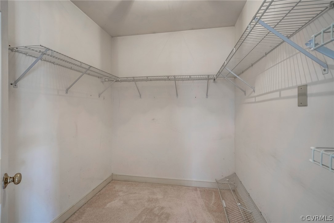 6205 Lansgate Road Midlothian, VA 23112 - Photo 42 of 50 a view of a room with racks on the wall
