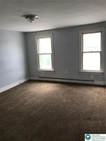an empty room with a window