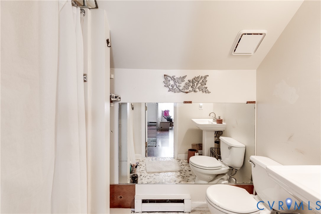 926 Marblethorpe Road North Chesterfield, VA 23236 - Photo 13 of 18 a bathroom with a sink toilet and shower