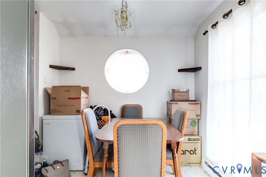 926 Marblethorpe Road North Chesterfield, VA 23236 - Photo 6 of 18 a living room with furniture and a mirror