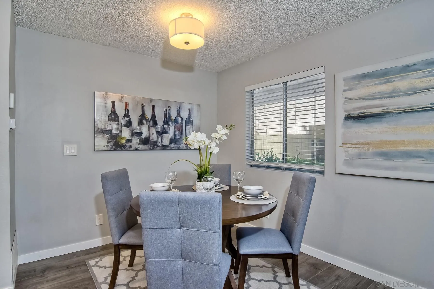 9925 Mission Gorge Road, Unit 3 Santee, CA 92071 - Photo 6 of 24 a dining room with furniture and window