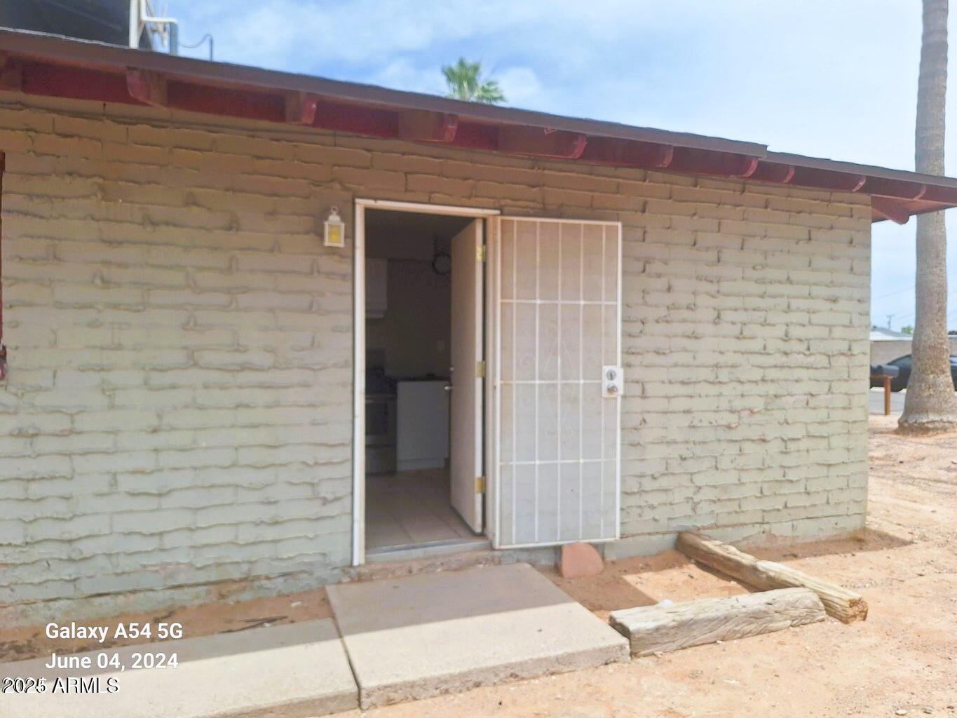 2401 North Amarillo Street, Unit 1 Casa Grande, AZ 85122 - Photo 12 of 14 a brick building with a door