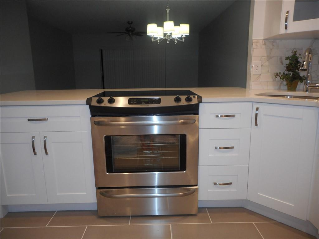 136 South Cypress Road, Unit 312 Pompano Beach, FL 33060 - Photo 5 of 33 Open Concept kitchen