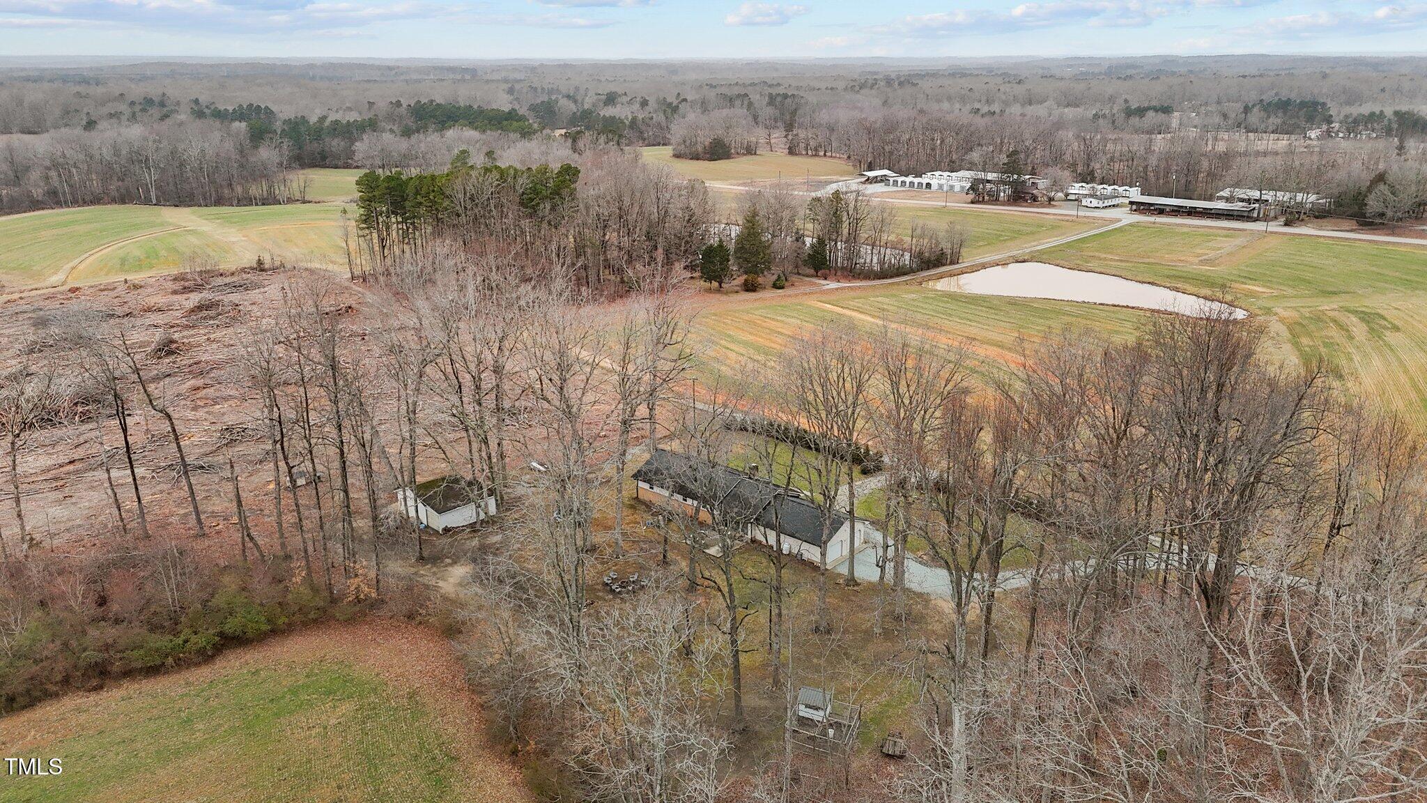 2144 Blalock Dairy Road Roxboro, NC 27574 - Photo 10 of 42 a view of a lake with houses