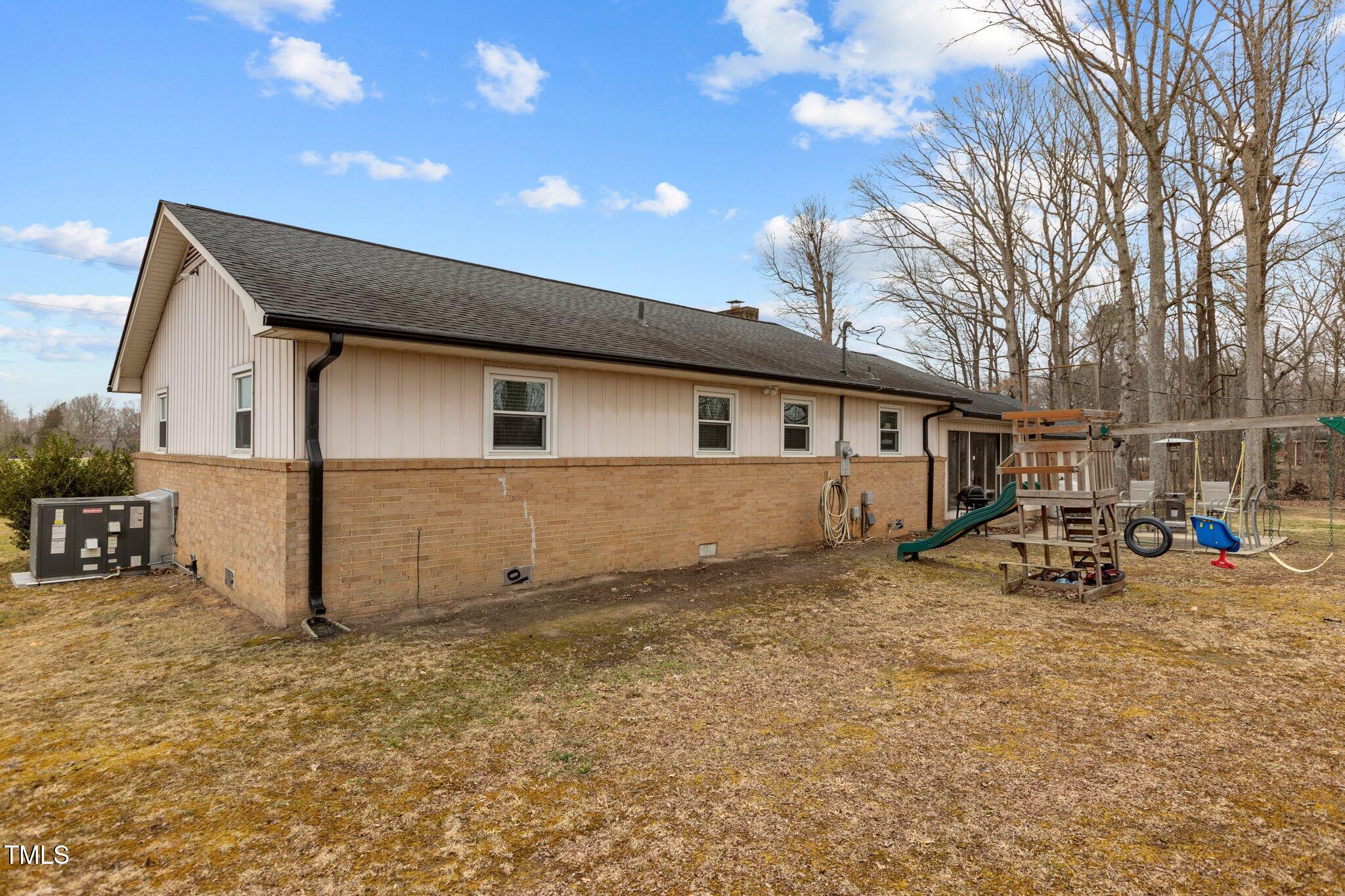 2144 Blalock Dairy Road Roxboro, NC 27574 - Photo 36 of 42 a view of a house with backyard