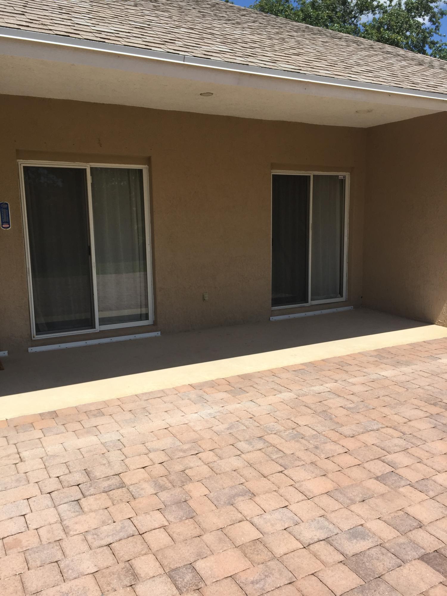 137 Southwest Sea Lion Road Port St. Lucie, FL 34953 - Photo 17 of 20 Back Patio