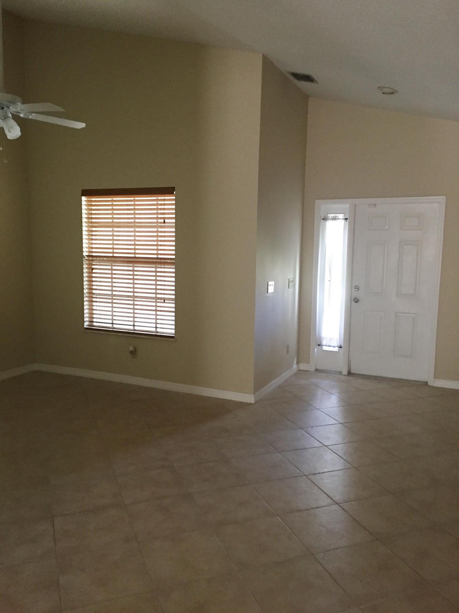 137 Southwest Sea Lion Road Port St. Lucie, FL 34953 - Photo 3 of 20 Entryway/Den
