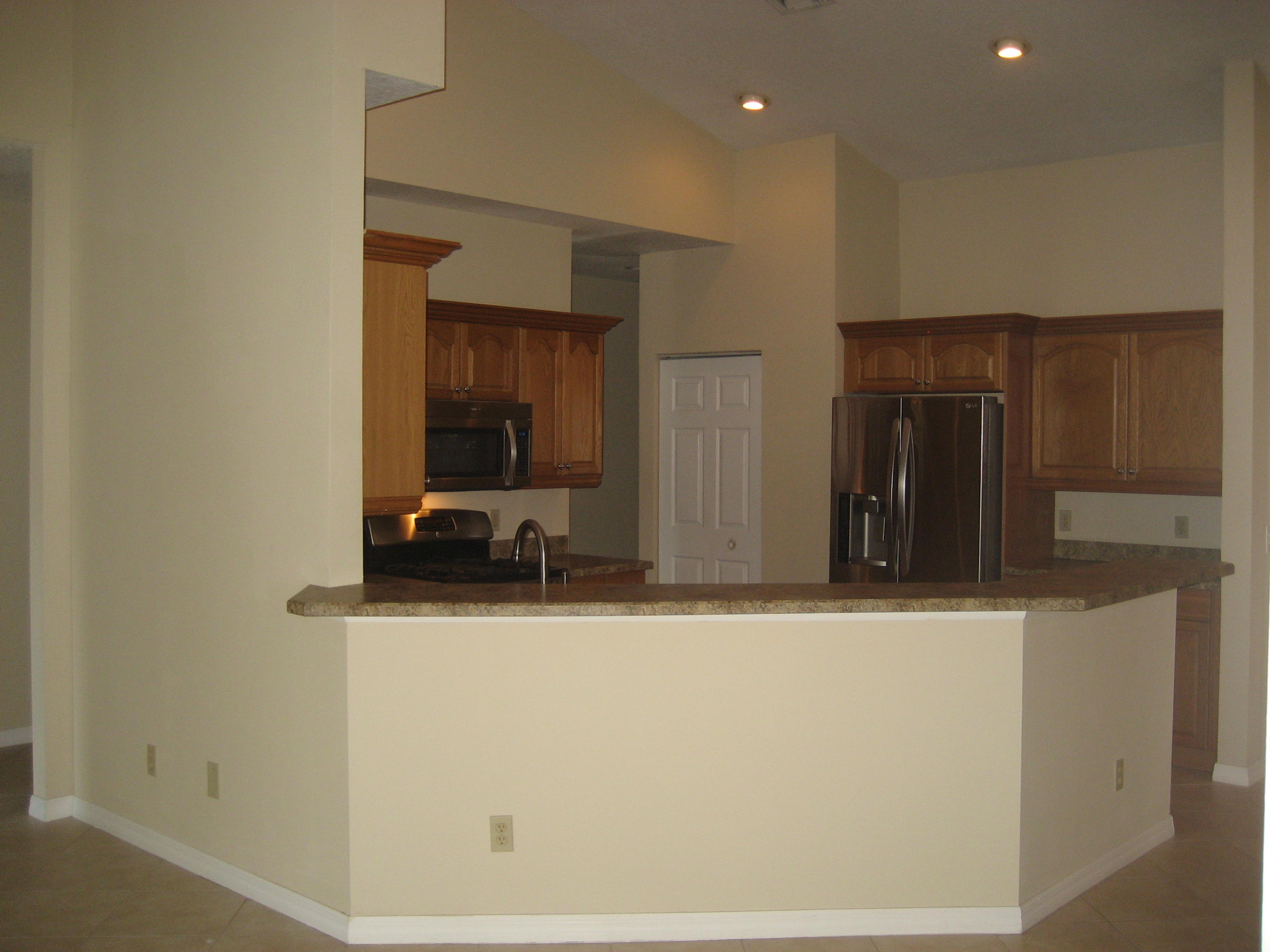 137 Southwest Sea Lion Road Port St. Lucie, FL 34953 - Photo 4 of 20 Kitchen/Breakfast Bar