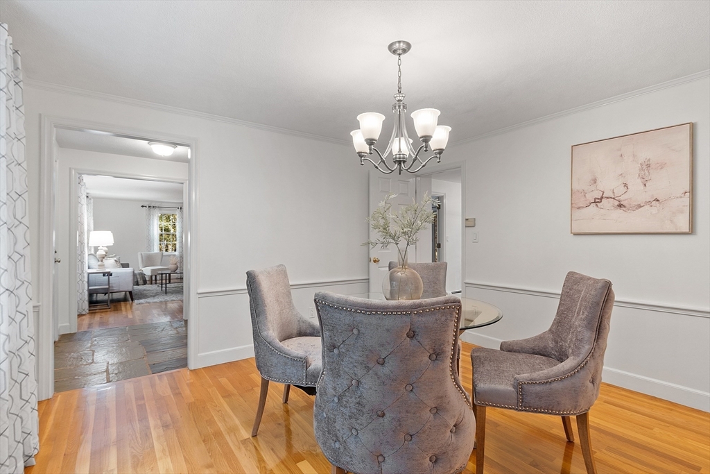 31 Herrick Road Boxford, MA 01921 - Photo 13 of 40 a view of a dining room with furniture and wooden floor