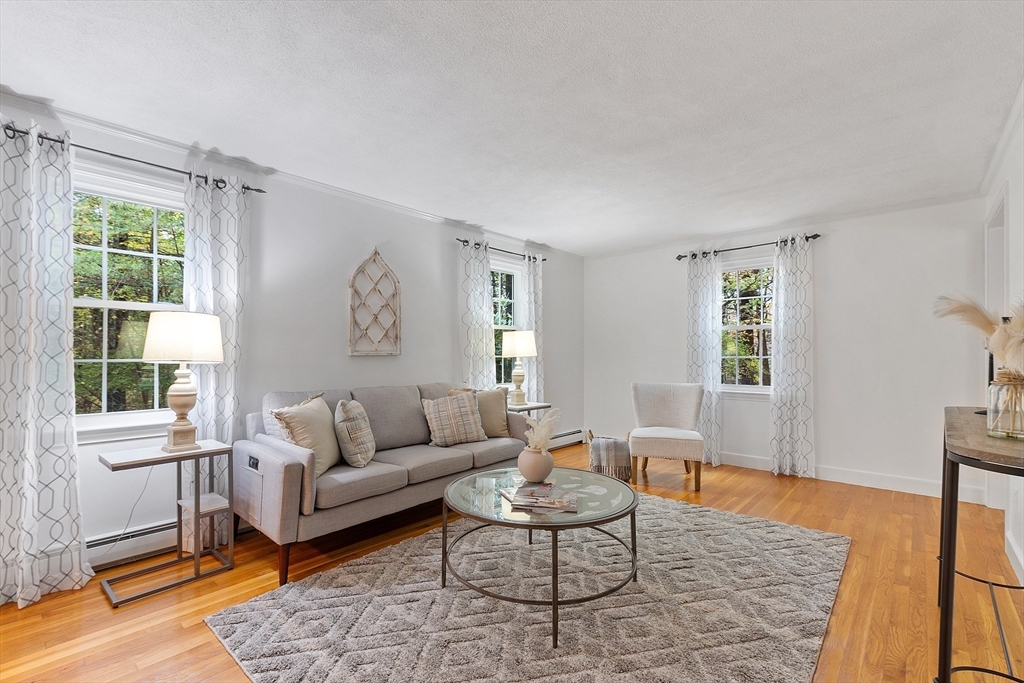 31 Herrick Road Boxford, MA 01921 - Photo 16 of 40 a living room with furniture and a window