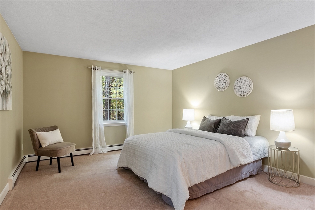 31 Herrick Road Boxford, MA 01921 - Photo 18 of 40 a bedroom with a bed and a window