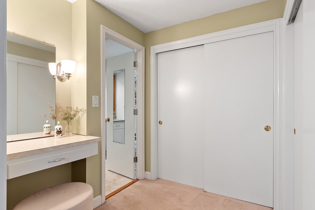 31 Herrick Road Boxford, MA 01921 - Photo 20 of 40 a bathroom with a shower sink and mirror
