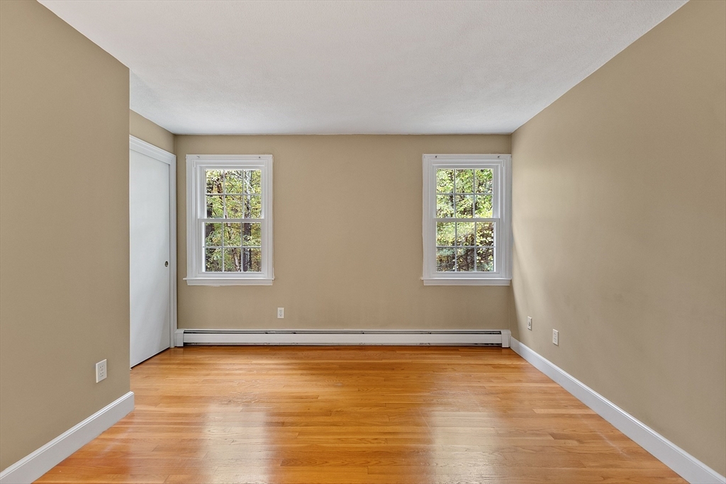31 Herrick Road Boxford, MA 01921 - Photo 23 of 40 wooden floor in an empty room with a window