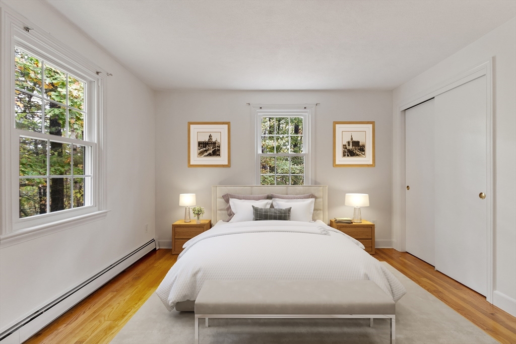 31 Herrick Road Boxford, MA 01921 - Photo 25 of 40 a bedroom with a bed and a window