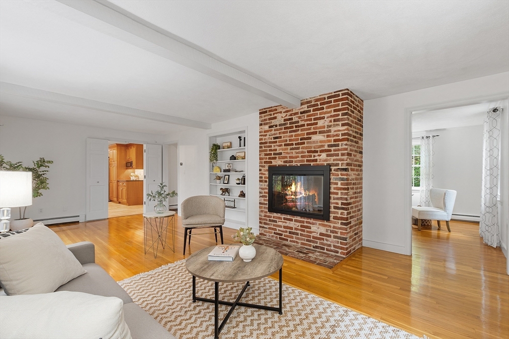 31 Herrick Road Boxford, MA 01921 - Photo 3 of 40 a living room with furniture and a fireplace