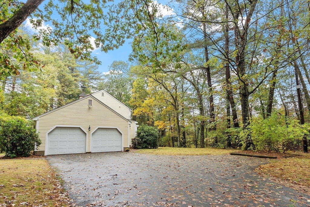 31 Herrick Road Boxford, MA 01921 - Photo 32 of 40 a view of a house with a yard