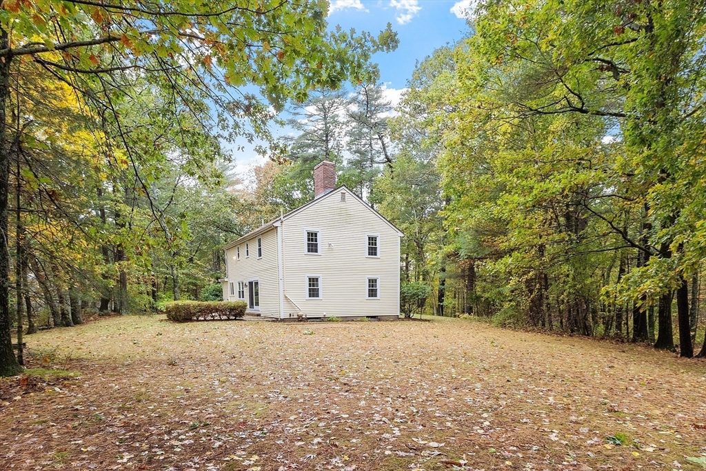 31 Herrick Road Boxford, MA 01921 - Photo 33 of 40 a view of a house with a yard and tree