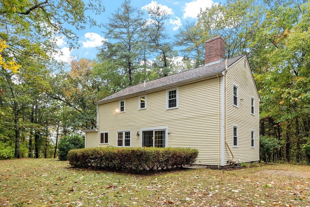 31 Herrick Road Boxford, MA 01921 - Photo 34 of 40 a view of a house with a yard