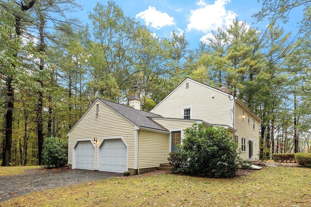 31 Herrick Road Boxford, MA 01921 - Photo 35 of 40 a view of a house with a yard