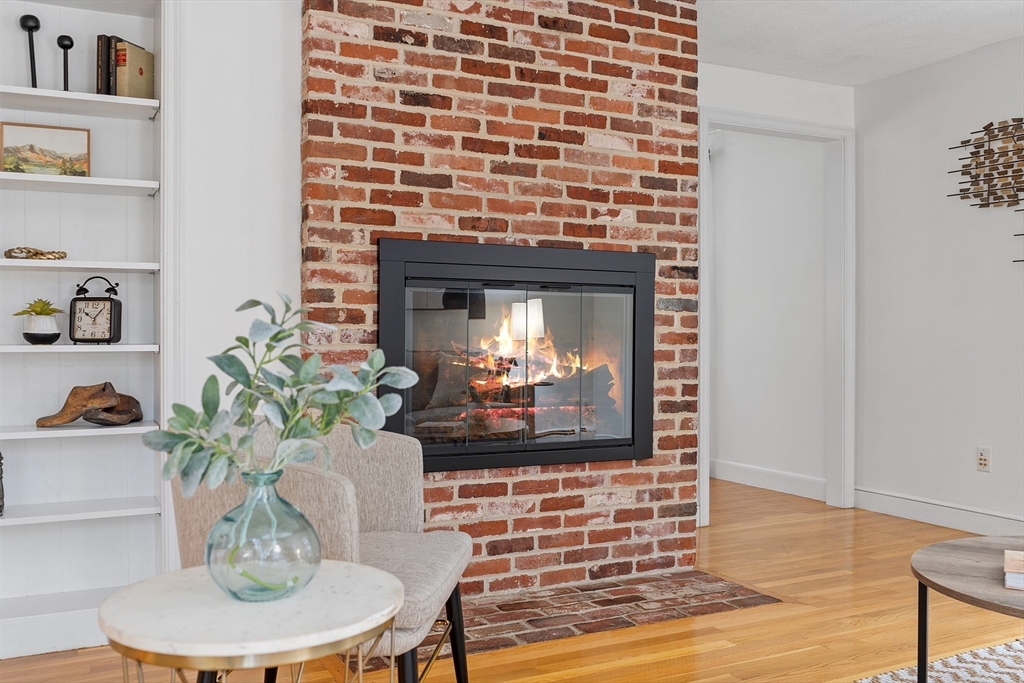 31 Herrick Road Boxford, MA 01921 - Photo 4 of 40 a living room with furniture and a fireplace