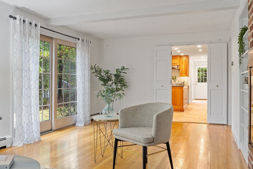 31 Herrick Road Boxford, MA 01921 - Photo 6 of 40 a view of a dining room with furniture and a potted plant