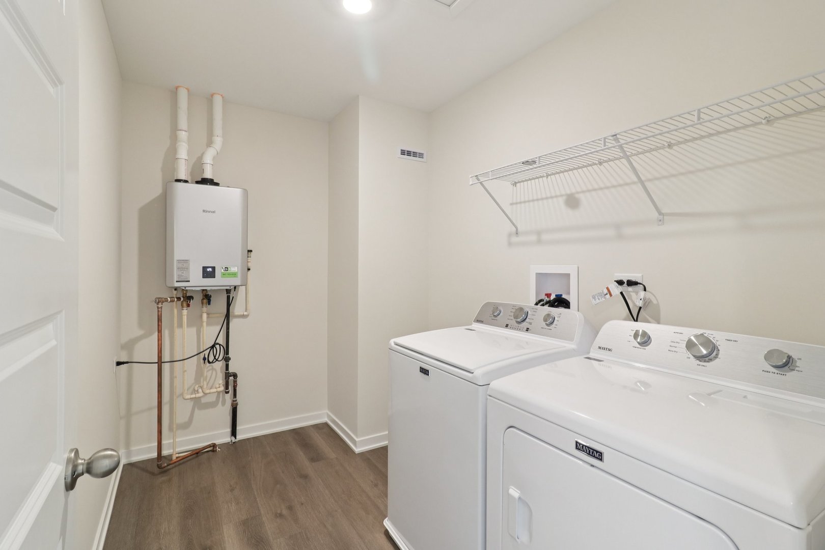 1748 Stable Lane Aurora, IL 60503 - Photo 29 of 34 a utility room with closet dryer and washer