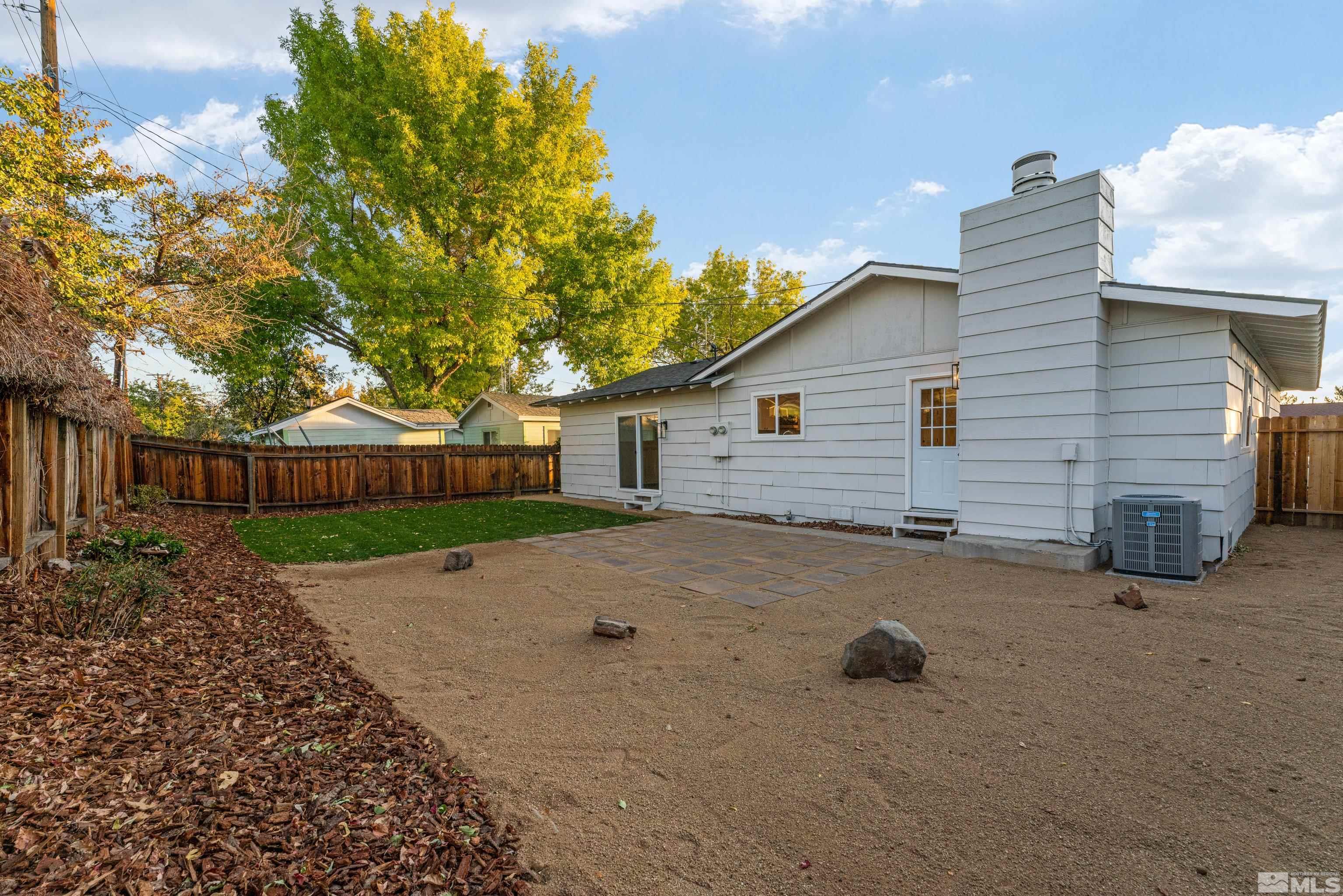 689 Beldon Way Reno, NV 89503 - Photo 27 of 30 a view of a backyard with wooden fence