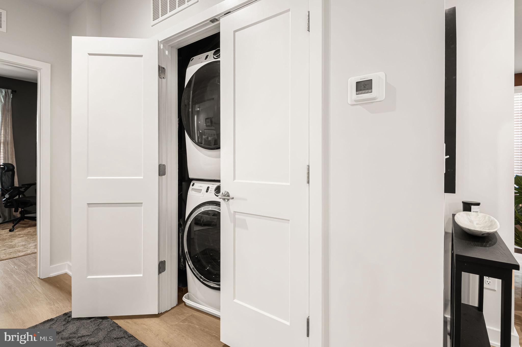 26 South York Road, Unit 101 Hatboro, PA 19040 - Photo 15 of 56 a utility room with dryer and washer