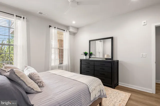 a workspace with furniture and a window