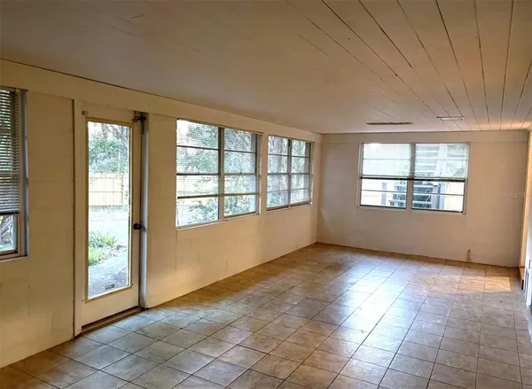 an empty room with windows