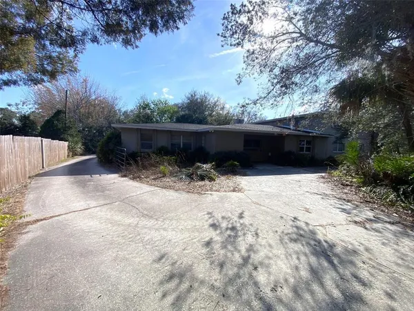 a view of wooden floor and a yard