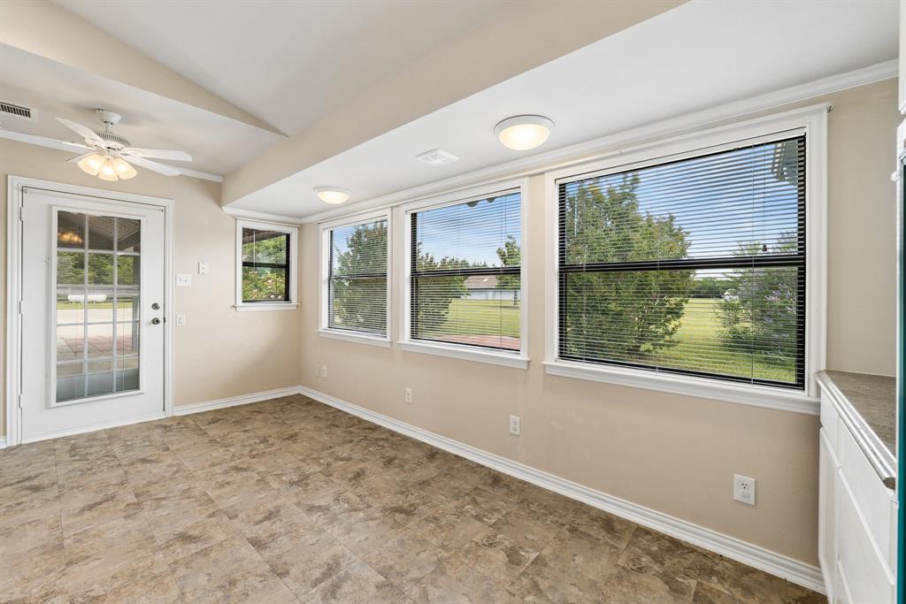 1175 Bloom Street Lucas, TX 75002 - Photo 15 of 36 an empty room with wooden floor and windows