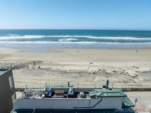 a view of a workspace room with furniture
