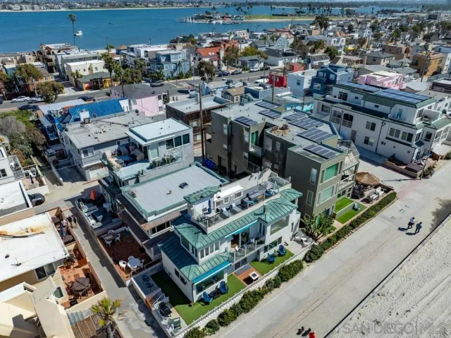 an aerial view of beach and ocean