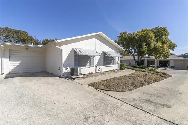 a view of house with outdoor space and street view