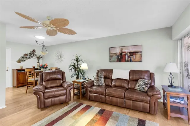 a kitchen with stainless steel appliances a stove a sink and a refrigerator
