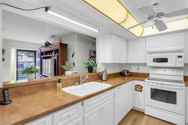 a view of a living room and dining room