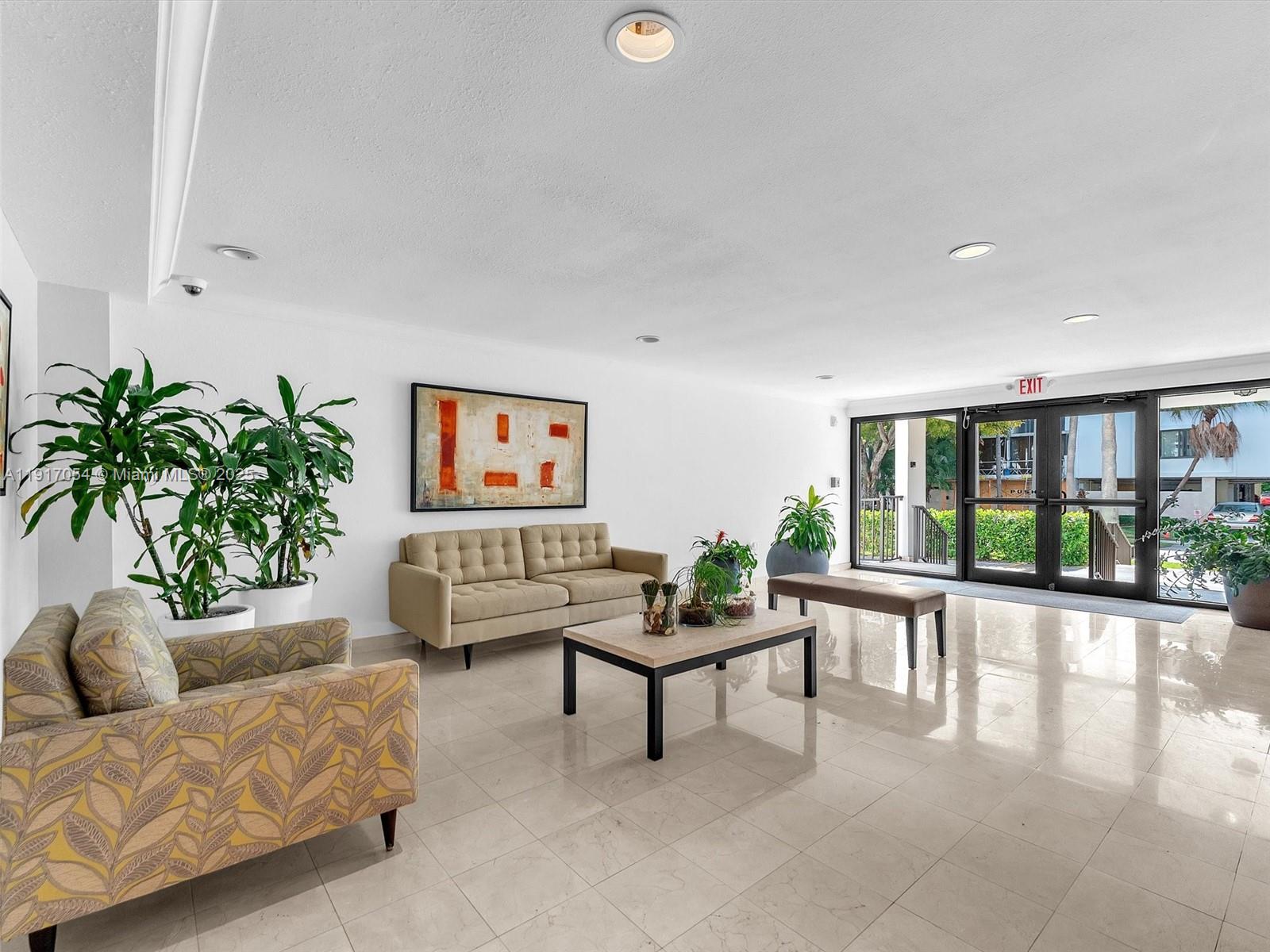 Key Biscayne Key Biscayne, FL 33149 - Photo 16 of 19 a living room with furniture and a large window with outer view