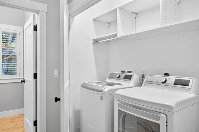 a view of a living room and dining room