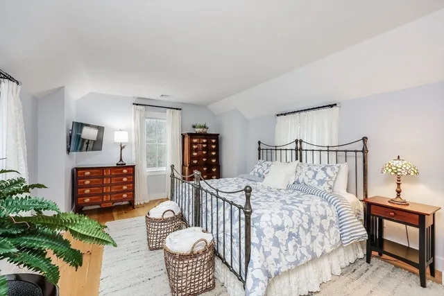 a bathroom with a shower sink and mirror