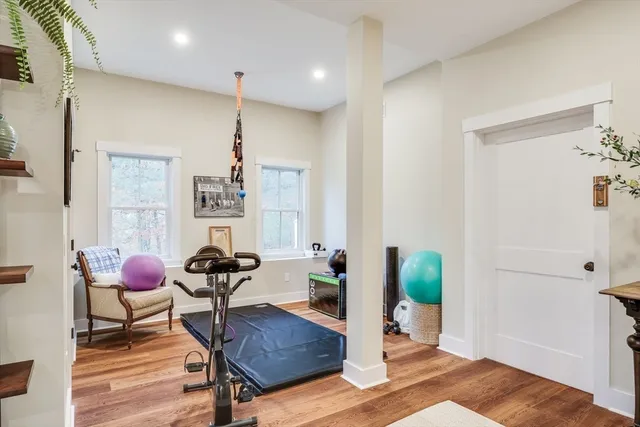 a bathroom with a sink toilet vanity and shower