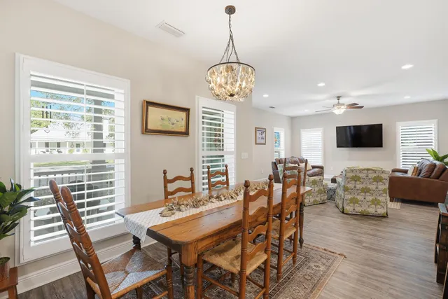 a bedroom with a bed and a table