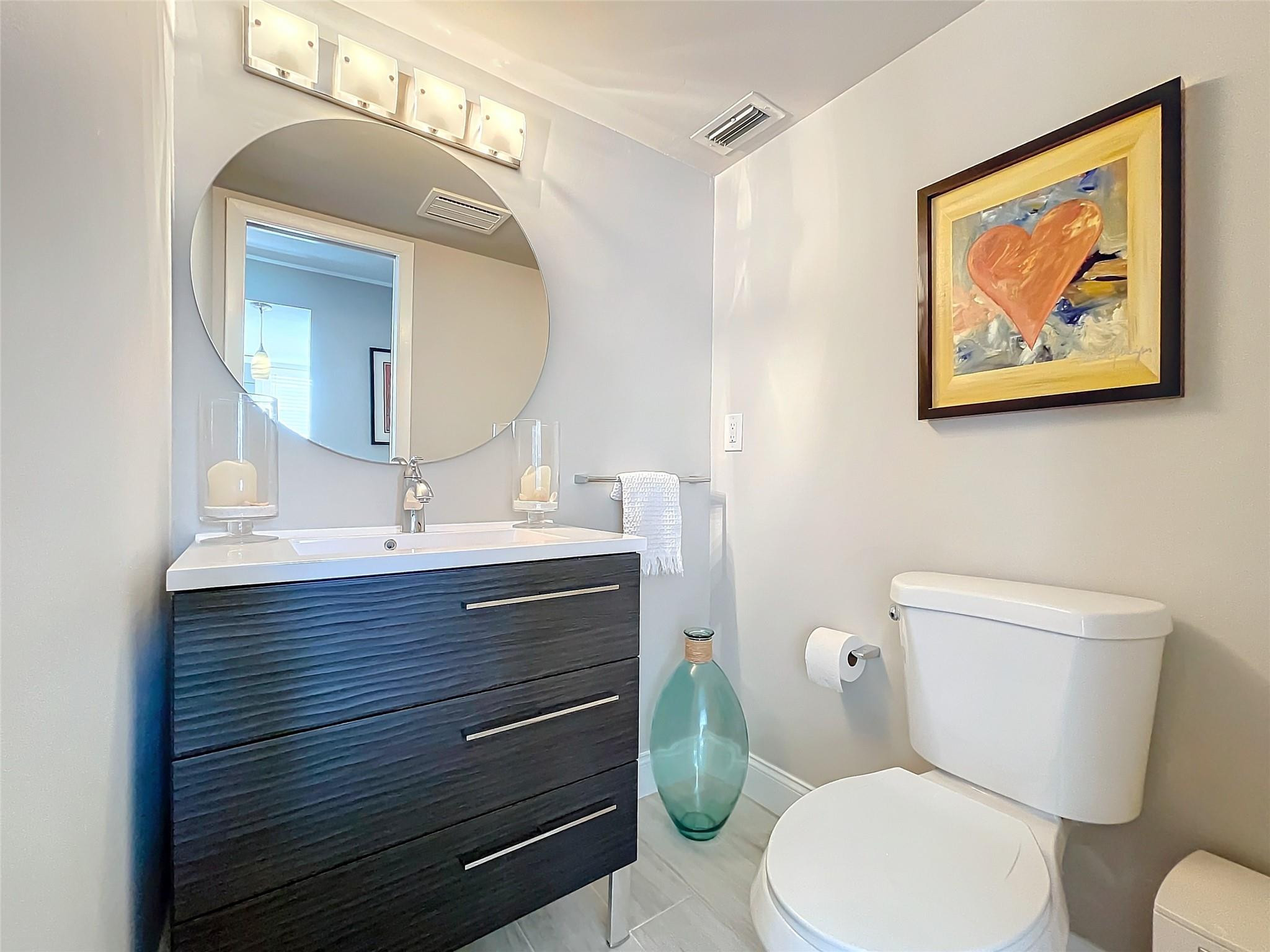 5340 Northwest 2nd Avenue, Unit 3200 Boca Raton, FL 33487 - Photo 11 of 48 Entry hallway half bath