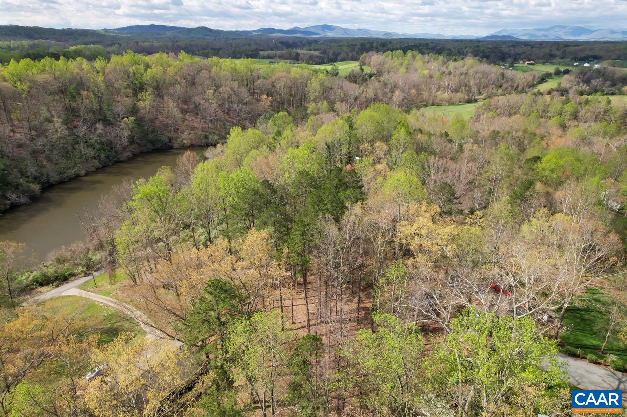 Tbd Lakeside Drive Charlottesville, VA 22901 - Photo 18 of 26 a view of a lake with a yard and large trees