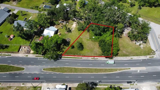 a view of a swimming pool with an outdoor space