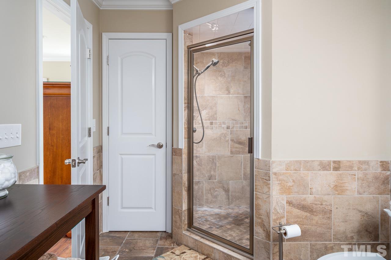 6668 Roby Coe Road Ramseur, NC 27316 - Photo 30 of 59 a bathroom with a shower