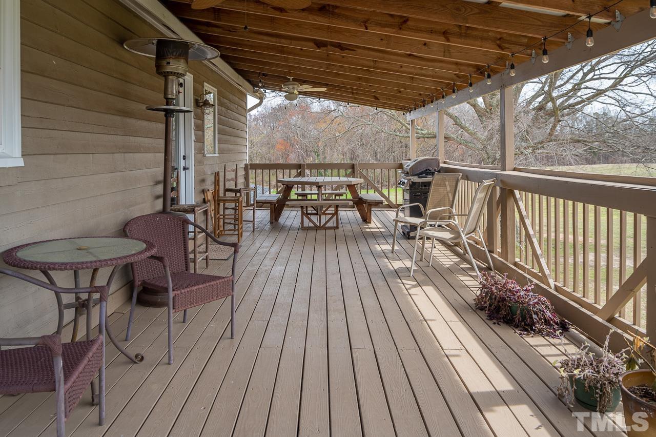 6668 Roby Coe Road Ramseur, NC 27316 - Photo 43 of 59 a view of a chairs on the roof deck